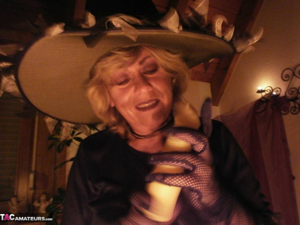 Wild mature witch Caro sticking a fat dildo up her juicy twat for a Halloween - #2
