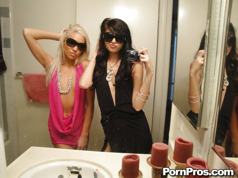 Skinny girls Kacey and Zoey showing off teenie tits while taking mirror selfie - #8