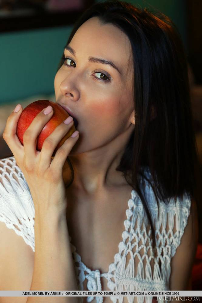 Long legged teen Adel Morel bites into an apple before modelling in the nude - #11