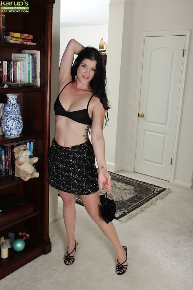 Solo strip scene by brunette milf named Veronica Stewart in sexy skirt - #16