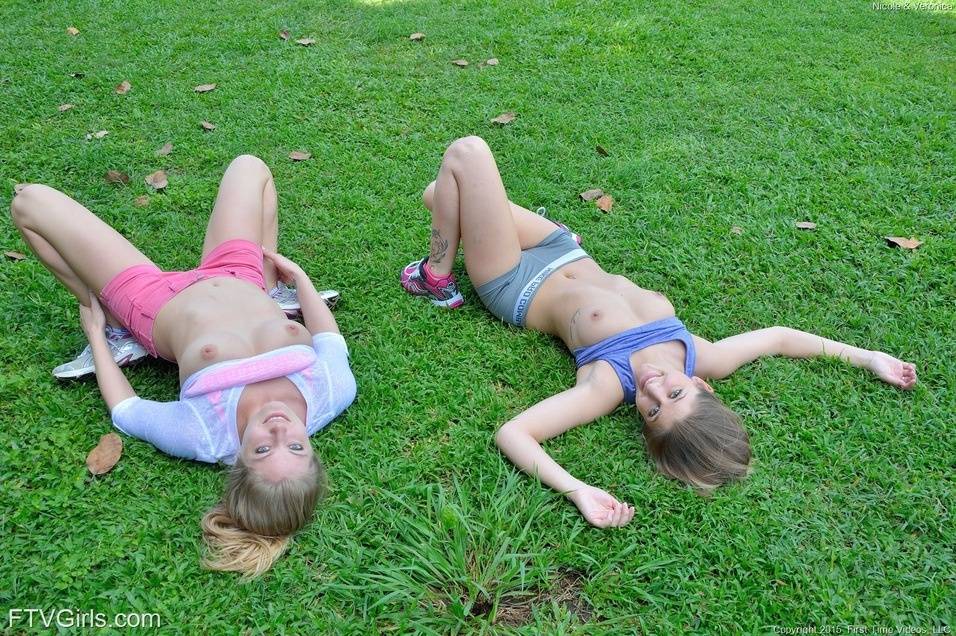 Fit lesbian girls flashing tits and ass outdoors on public street - #14