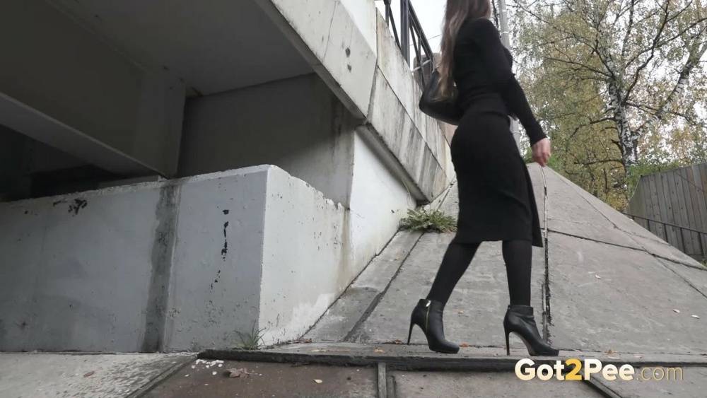 Distressed girl Sasha S pulls down her hose to pee underneath a bridge - #15