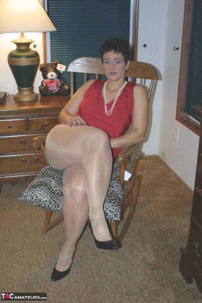 Short haired housewife Reba frees her pierced pussy from shiny pantyhose - #10