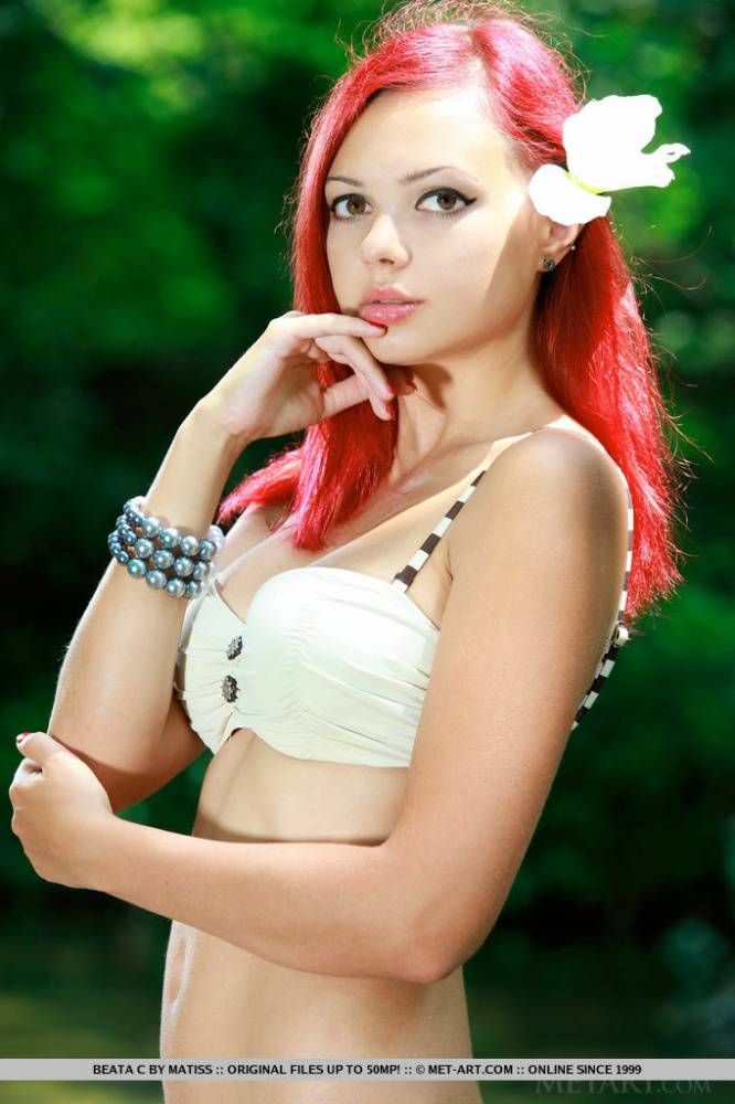 Hot redhead Beata C posing naked in the woods baring perky tits & bald vagina - #9