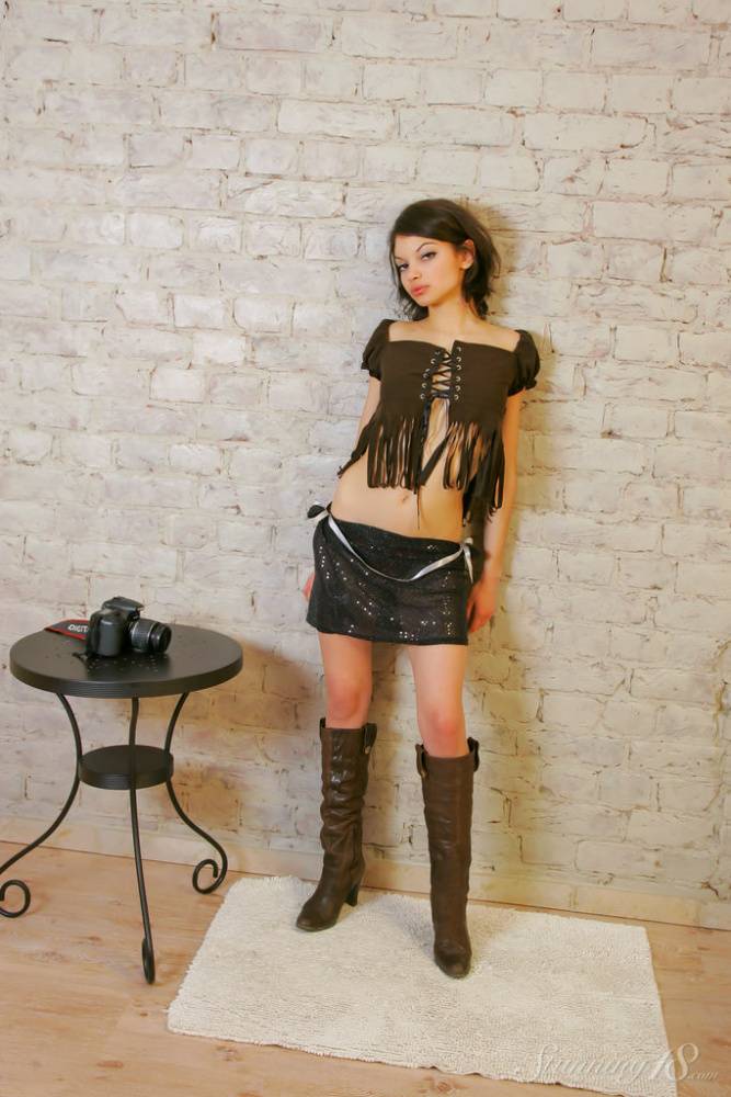 Solo girl Julia C removes a miniskirt as she strips to leather boots - #3