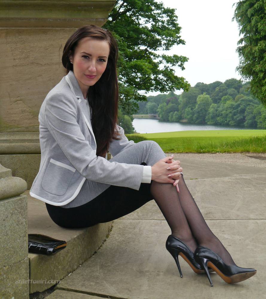 Clothed woman Sophia descends park steps in a long skirt and stiletto heels - #5