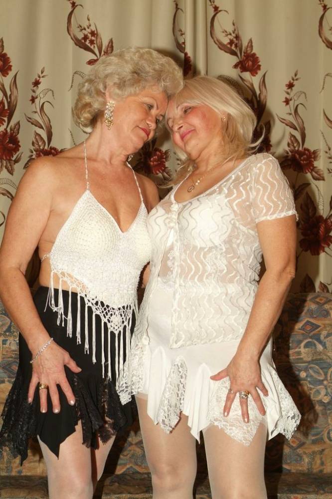 Blonde grandmothers engage in lesbian foreplay on a chesterfield - #6