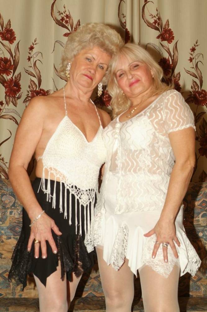 Blonde grandmothers engage in lesbian foreplay on a chesterfield - #8