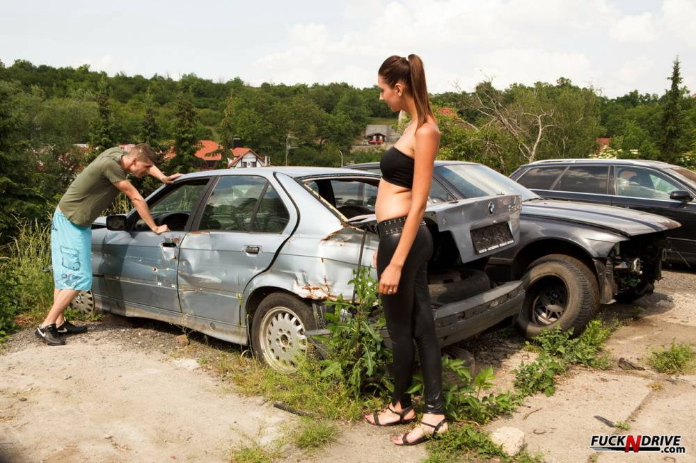 Tall girl and her man friend have sexual intercourse in a wrecker's yard - #3