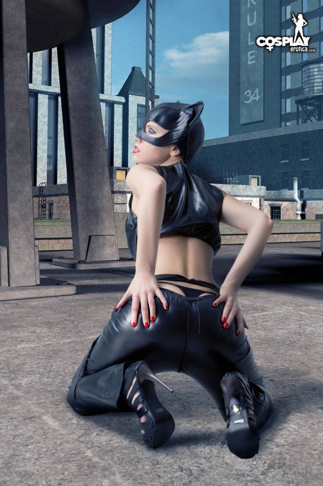 Beautiful girl gets naked in a leather Catwoman hood on a rooftop - #1