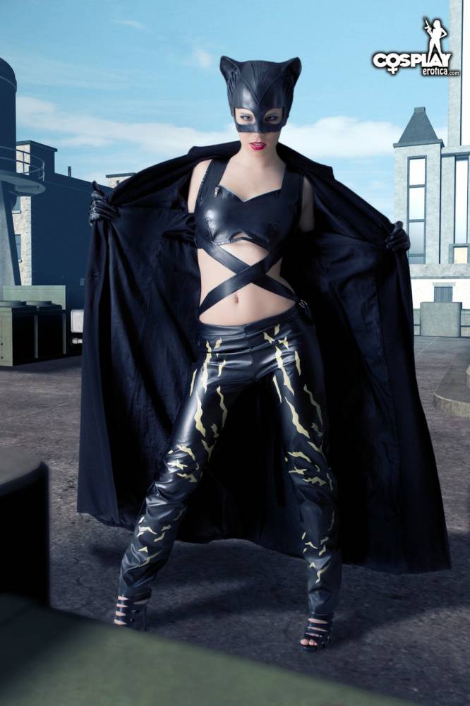 Beautiful girl gets naked in a leather Catwoman hood on a rooftop - #10