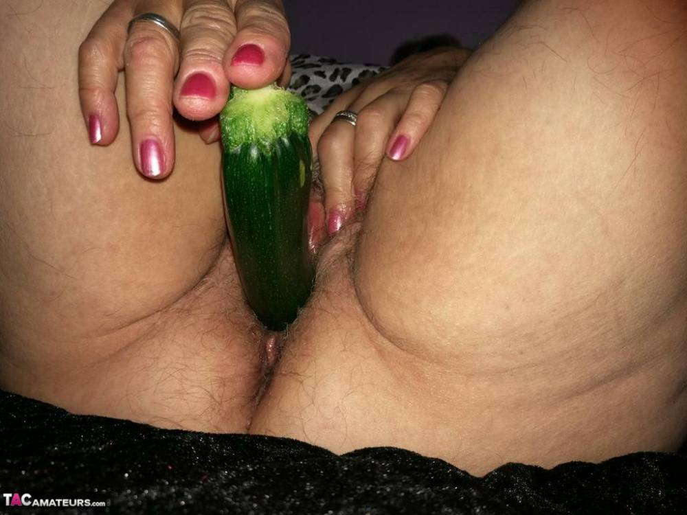 Old woman Caro satisfies her horny pussy with cucumber after pulling down hose - #10