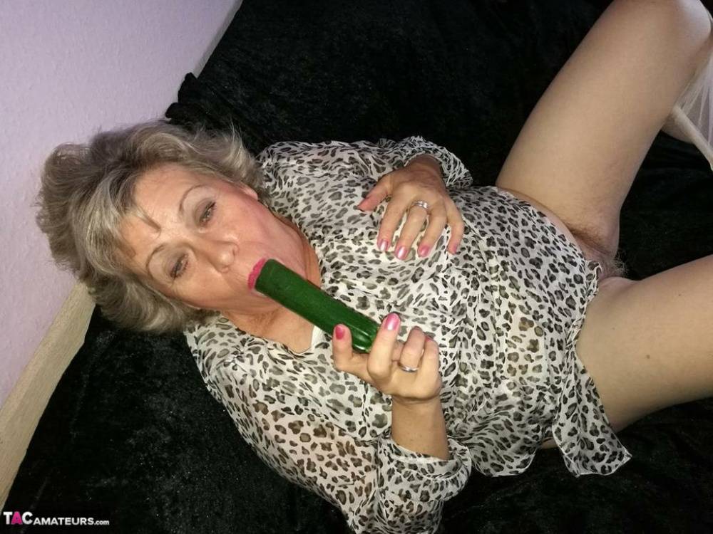 Old woman Caro satisfies her horny pussy with cucumber after pulling down hose - #12