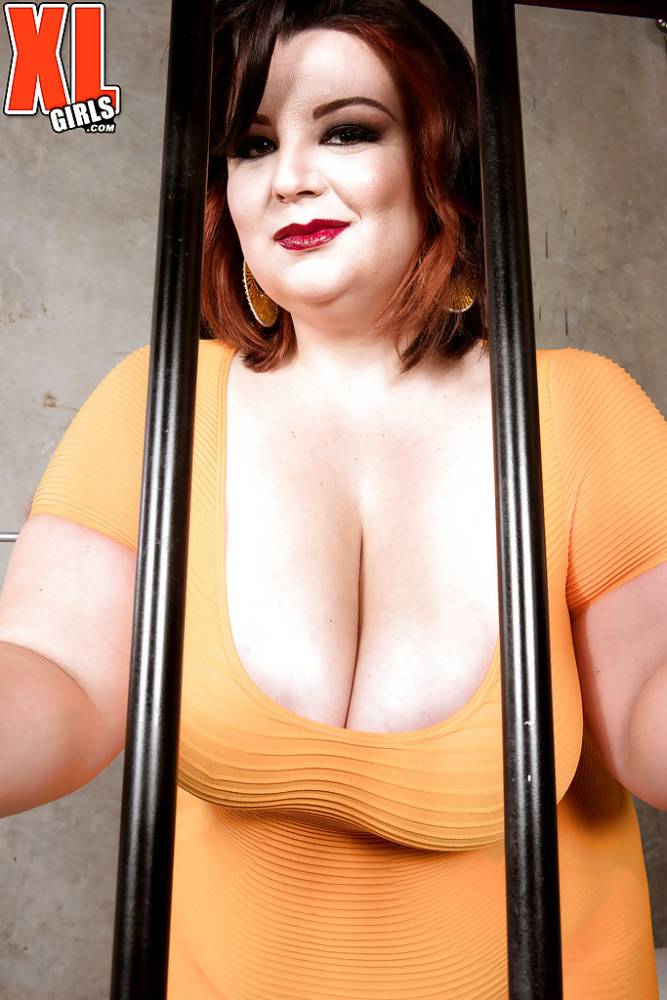 Brunette BBW Lucy Lenore frees huge knockers for nipple play in prison cell - #9