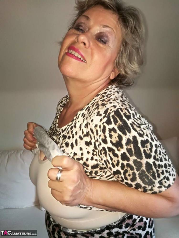 Horny nan Caro pets her snatch prior to fondling her natural breasts - #1