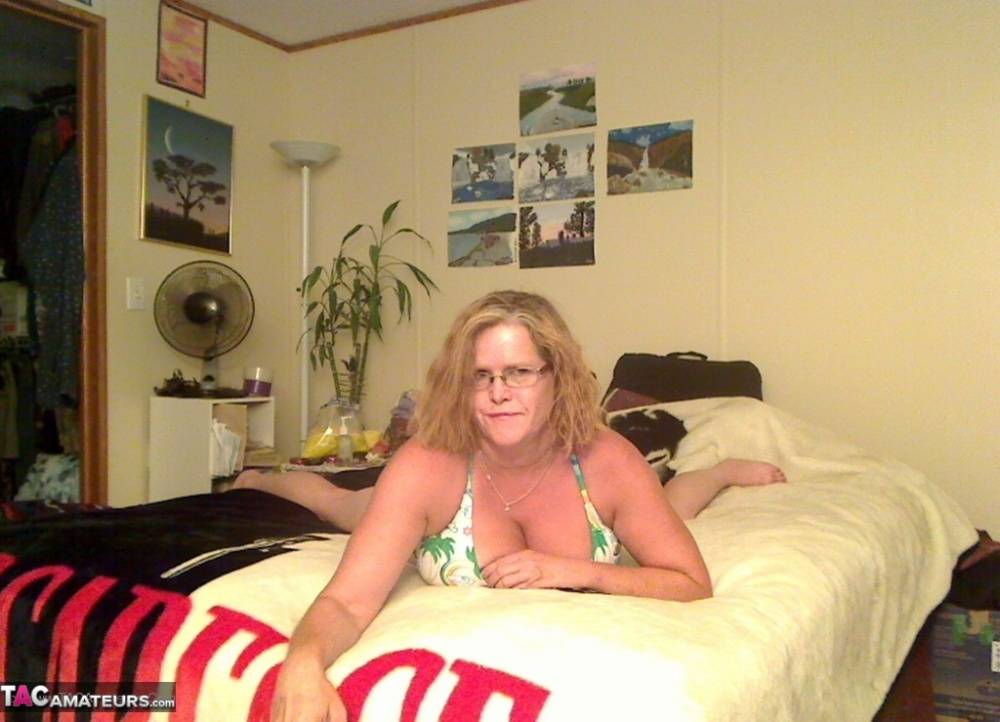 Busty Middle-aged amateur Misha MILF rides a dildo on her bed in glasses - #13