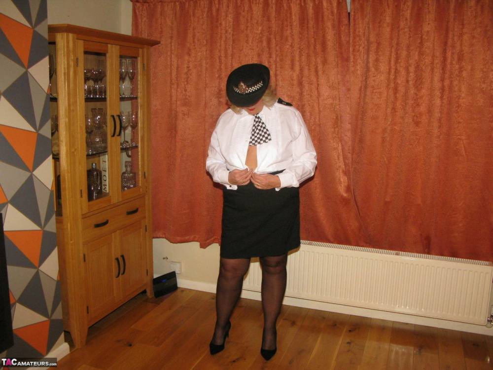 Mature policewoman Chrissy Uk looses her tits and twat from her uniform - #5