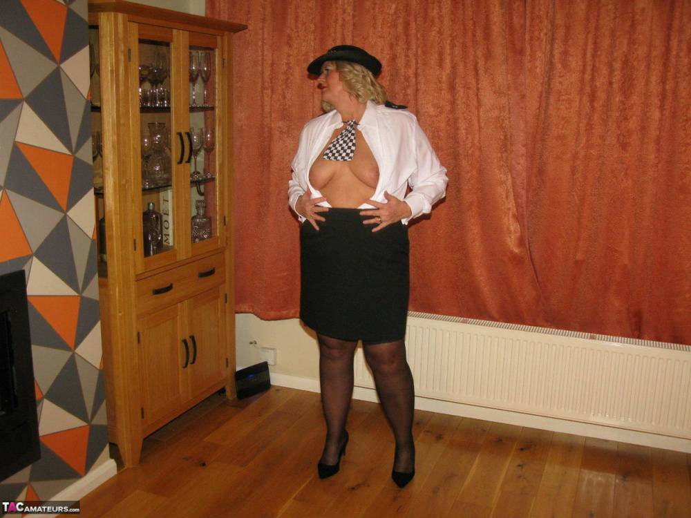 Mature policewoman Chrissy Uk looses her tits and twat from her uniform - #11