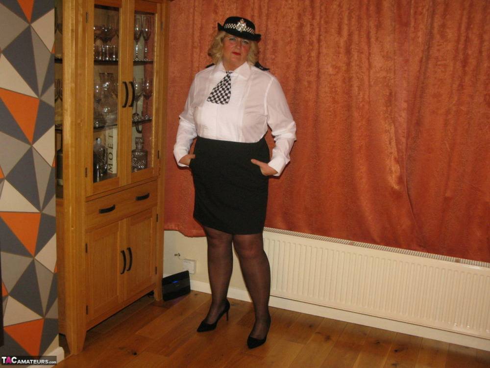 Mature policewoman Chrissy Uk looses her tits and twat from her uniform - #6