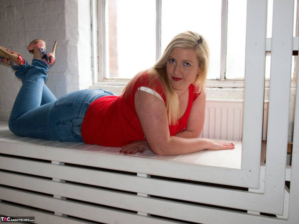 Blonde amateur Samantha exposes her thick body near a window - #12
