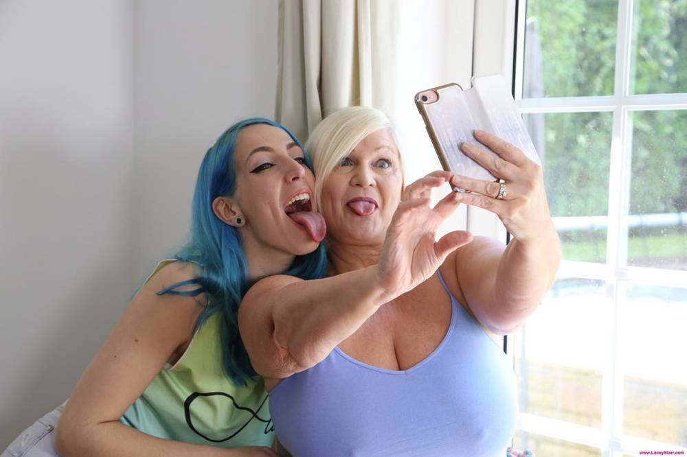 Older and younger lesbians Lacey Starr & Liz Rainbow take a selfie before sex - #11