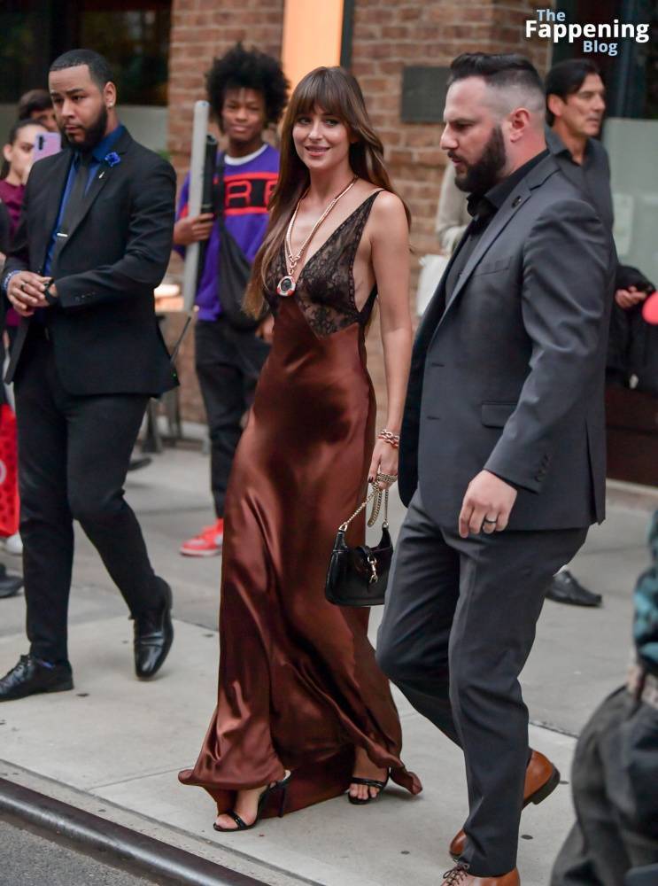 Dakota Johnson Stuns in a Copper Silk Gown Leaving Her Hotel in NYC (29 Photos) - #14