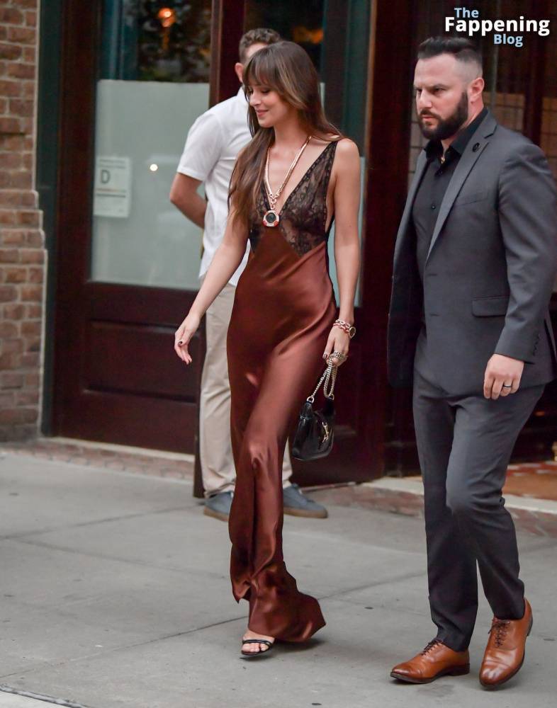 Dakota Johnson Stuns in a Copper Silk Gown Leaving Her Hotel in NYC (29 Photos) - #16