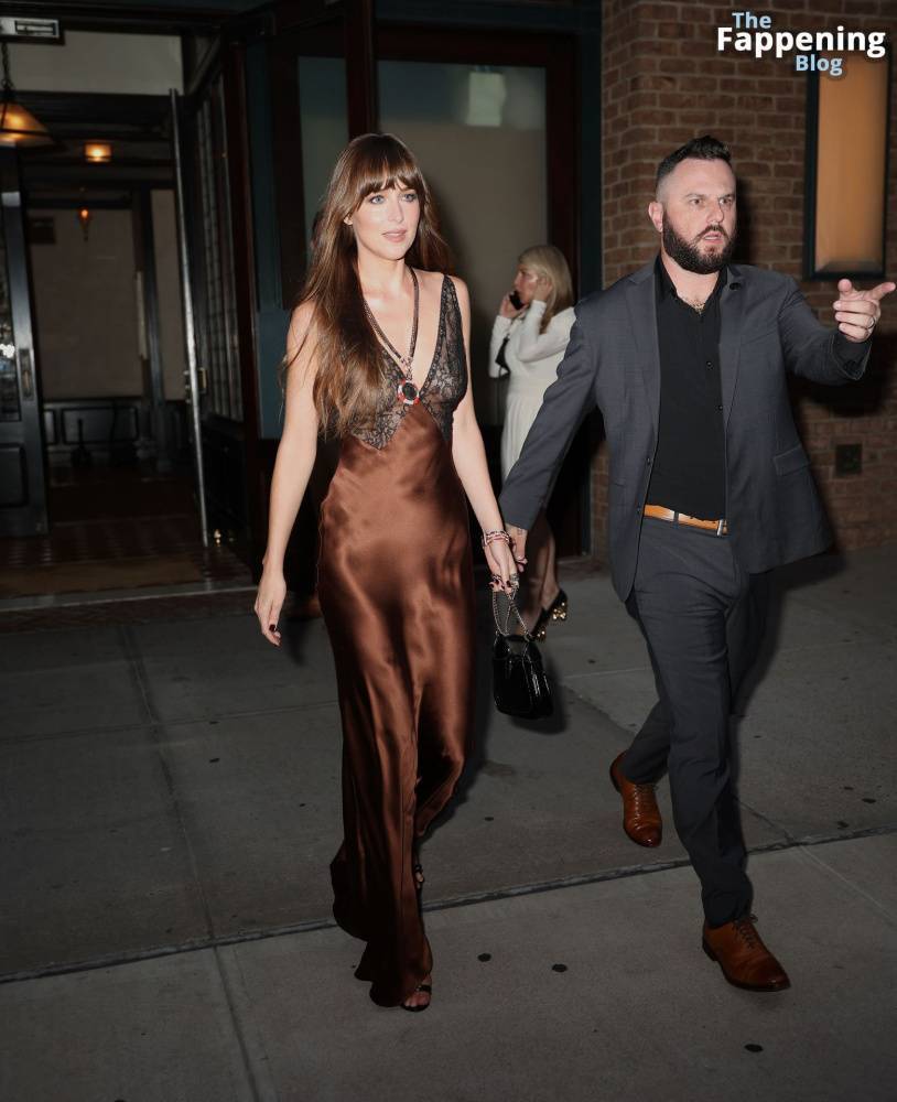 Dakota Johnson Stuns in a Copper Silk Gown Leaving Her Hotel in NYC (29 Photos) - #10