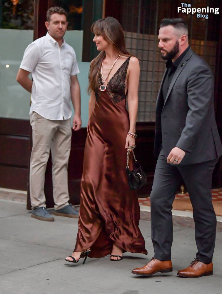 Dakota Johnson Stuns in a Copper Silk Gown Leaving Her Hotel in NYC (29 Photos) - #12