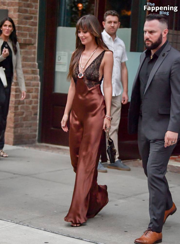 Dakota Johnson Stuns in a Copper Silk Gown Leaving Her Hotel in NYC (29 Photos) - #21