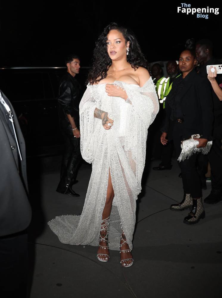 Rihanna Displays Her Curves in a White Dress (13 Photos) - #8