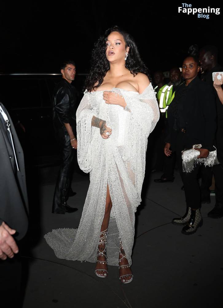 Rihanna Displays Her Curves in a White Dress (13 Photos) - #7