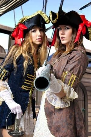 Female pirates partake in lesbian foreplay while on board a vessel - #main