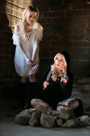 Fully clothed teens Dahlia Sky and Charlotte Stokely model in cosplay garb on amateurlikes.com