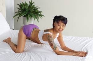 Tattooed Asian girl Saya Song has POV sex with a big white cock on amateurlikes.com