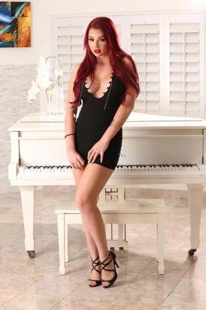 Hot redhead Skyla Novea sucks and tit fucks her man's long cock on amateurlikes.com