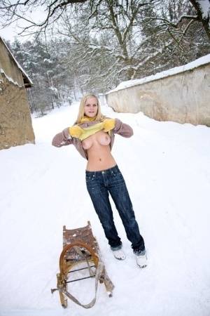 Busty blonde bares big tits in the snow & sucks POV for mouthful of cum on amateurlikes.com