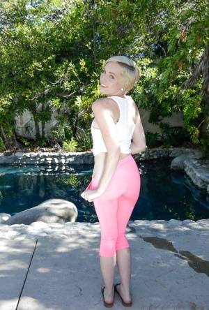 Pornstar Miley May takes off her leggings and plays with shaved snatch on amateurlikes.com