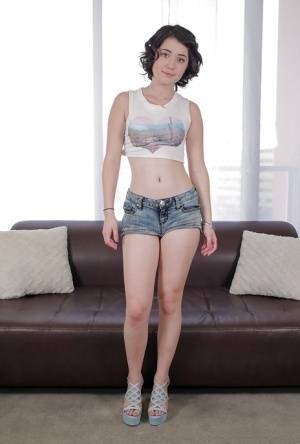 Amateur chick Cadence Carter posing in denim shorts for casting couch on amateurlikes.com
