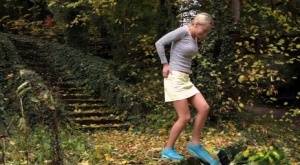 Cute blonde Victoria Pure hikes her skirt to take a pee along country lane on amateurlikes.com
