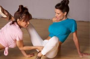 Clothed females Devon Michaels & Veronica Avluv grab crotches in yoga pants on amateurlikes.com
