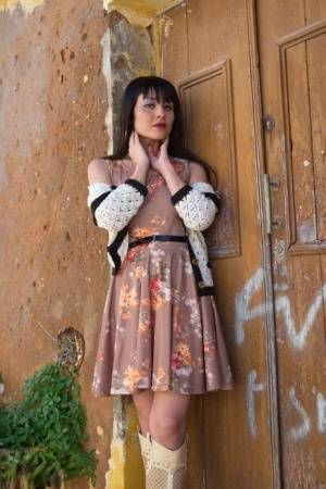 Asian model Sophia Jade flashes her upskirt panties on a cobblestone street on amateurlikes.com
