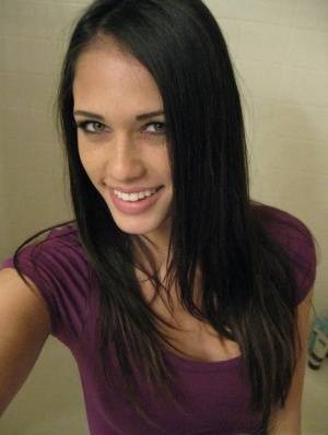 Skinny girl Tiffany Thompson takes nude selfies in a bathroom mirror on amateurlikes.com