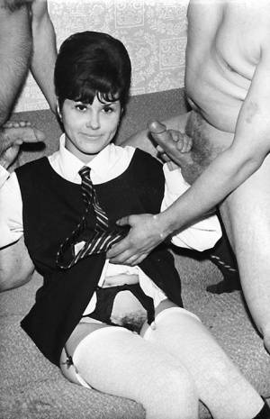 Small titted vintage schoolgirl removes her uniform for a big cock threesome on amateurlikes.com