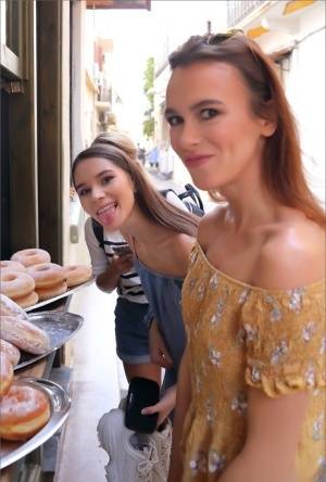 Leggy girls stumble across a donut stand while doing touristy things on amateurlikes.com
