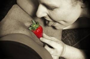 Mature lesbian Mollie Foxxx and her lover use strawberries during foreplay on amateurlikes.com