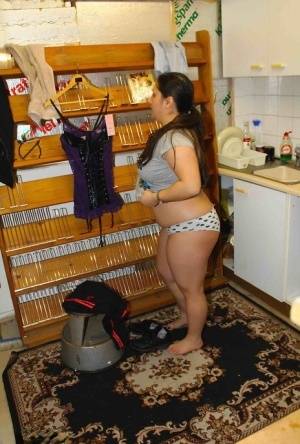 Fat amateur Kimberly Scott changes into lingerie inside a XXX store on amateurlikes.com