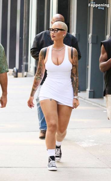 Amber Rose Turns Heads in a Revealing White Mini Dress During SoHo Outing (39 Photos) on amateurlikes.com