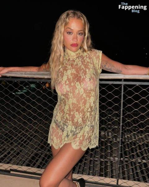 Rita Ora Shows Off Her Nude Boobs While Posing in a Sheer Dress (2 Photos) on amateurlikes.com