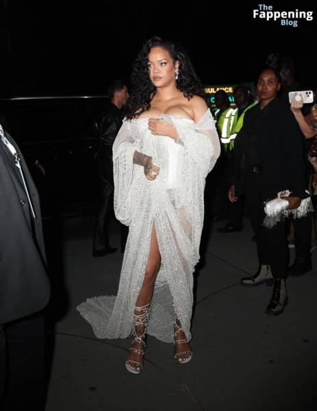 Rihanna Displays Her Curves in a White Dress (13 Photos) on amateurlikes.com